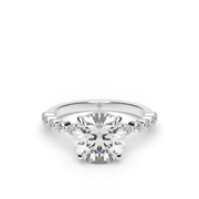 White Gold Round Shape Diamond Hidden Halo Engagement Ring With Side Stone Shared Prong Setting